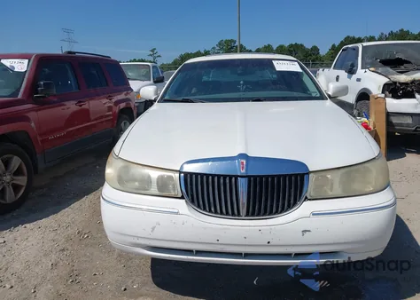 1999 Lincoln Town Car Signature из США, поврежденный, VIN 1LNHM82W6XY612217